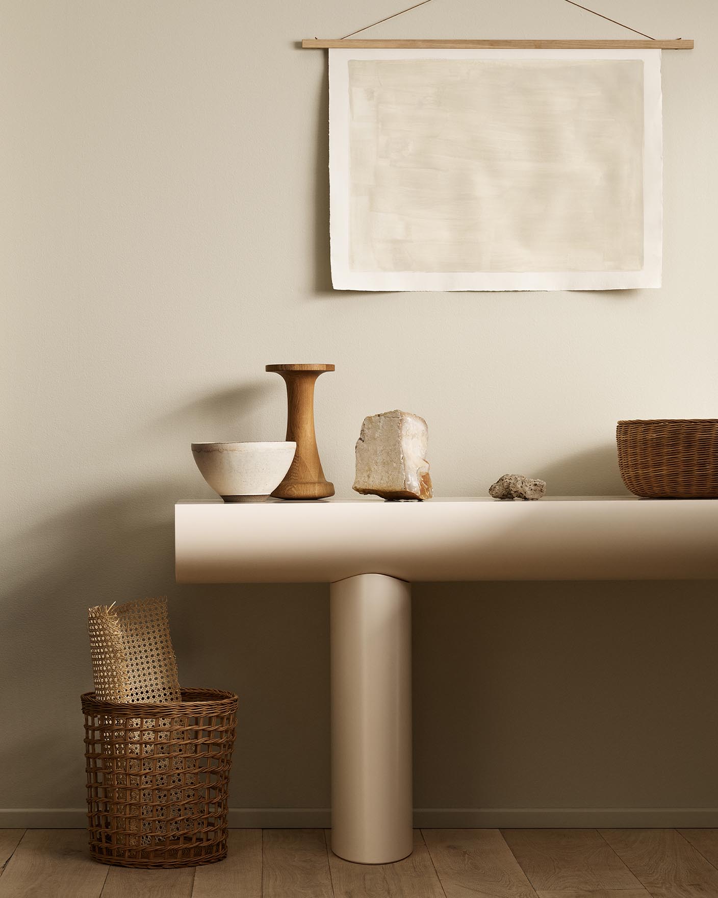 Minimalist console table with decor and baskets against a golden beige wall painted with Jotun's colour 12308 Unbleached.