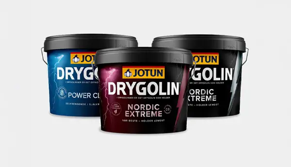 Tre Jotun Drygolin malingdåser i varianterne Power Clean, Nordic Extreme og Nordic Extreme på hvid baggrund