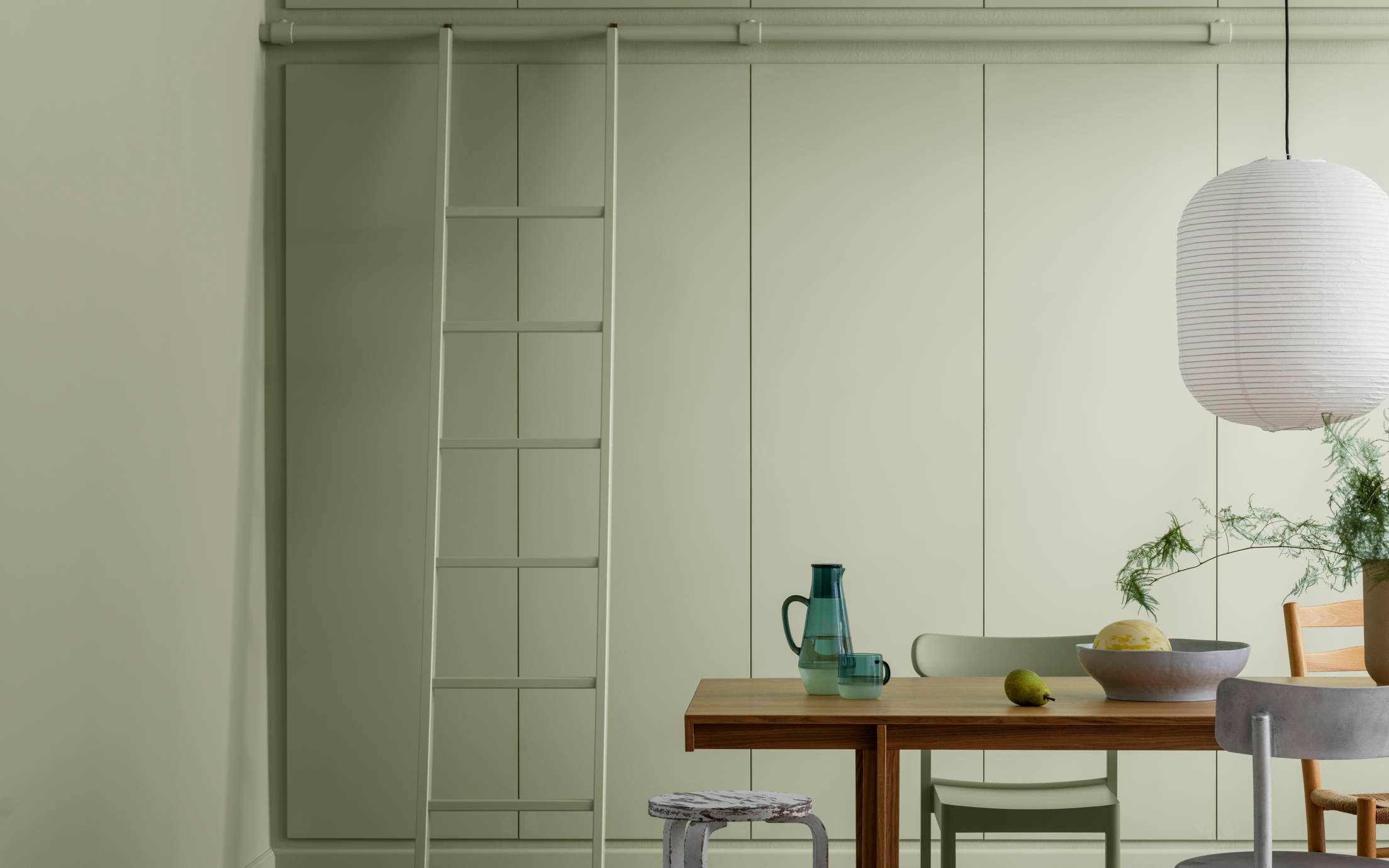 Dining area painted with Jotun Dusk green 3241 interior paint