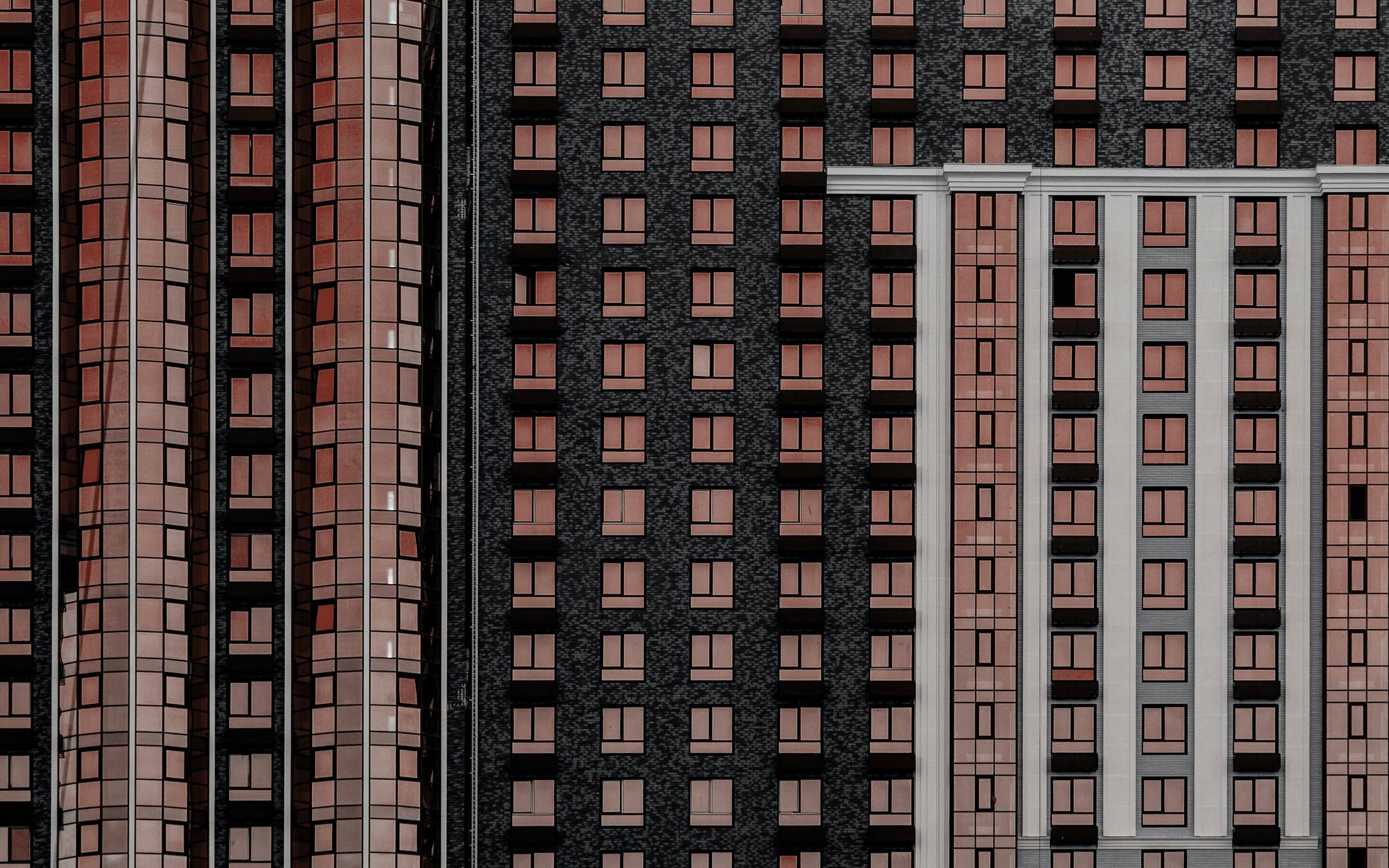 Buildings in red and black with many windows
