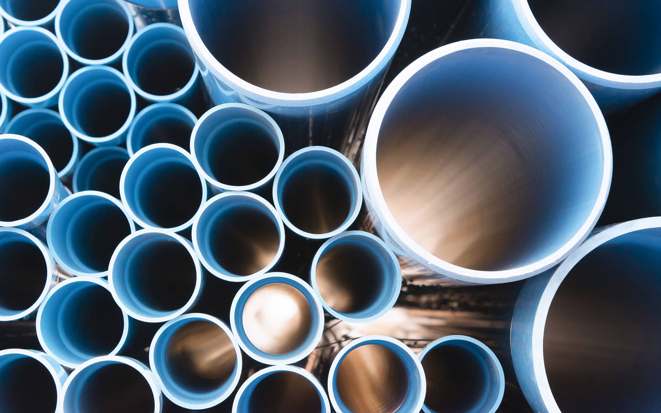 Water pipes stacked in a pile