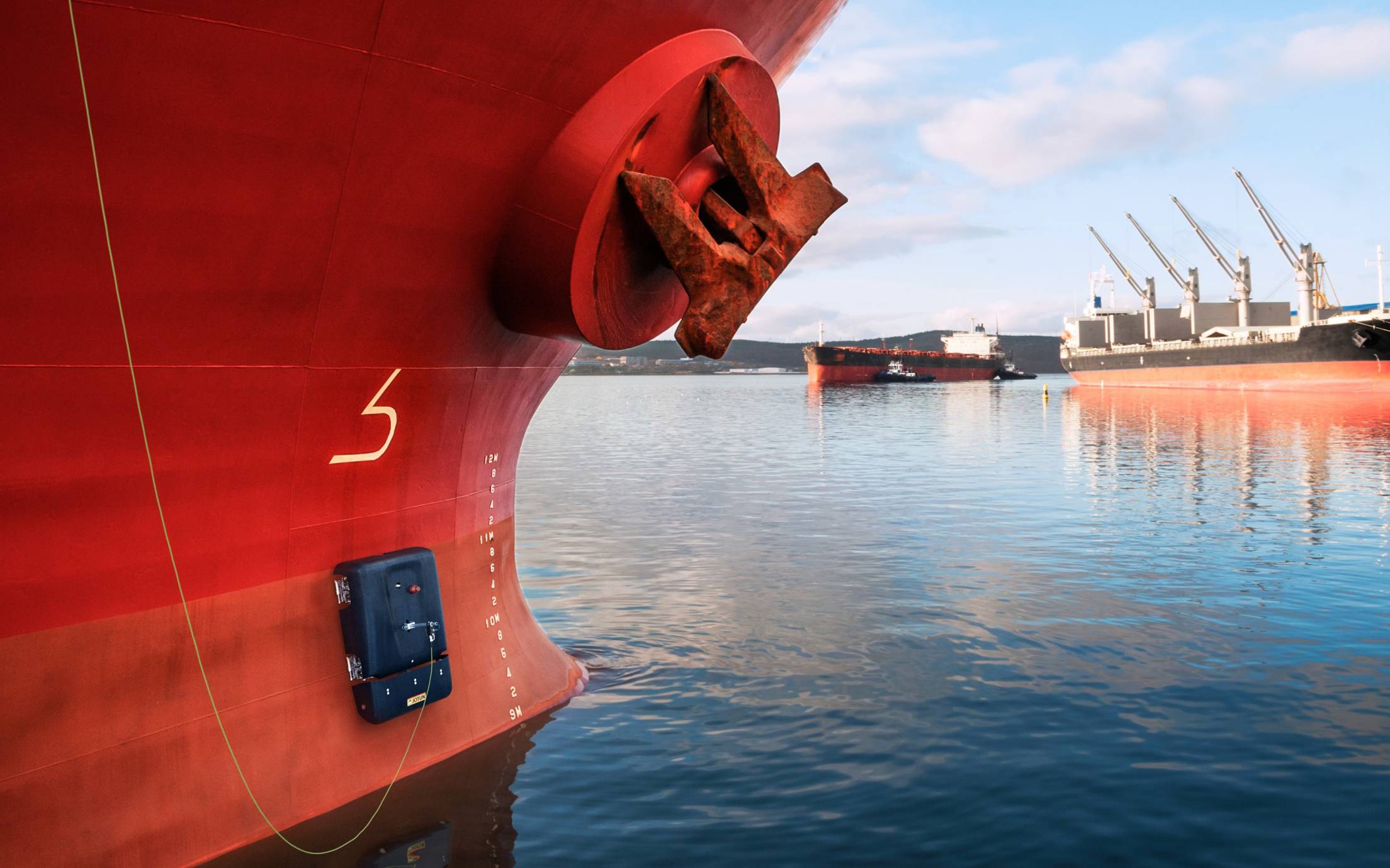 Ship hull treated with antifouling solution