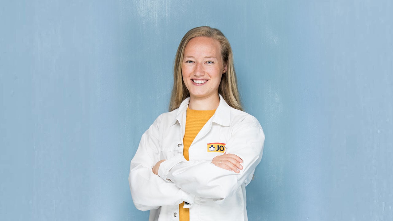 Female scientist in white uniform