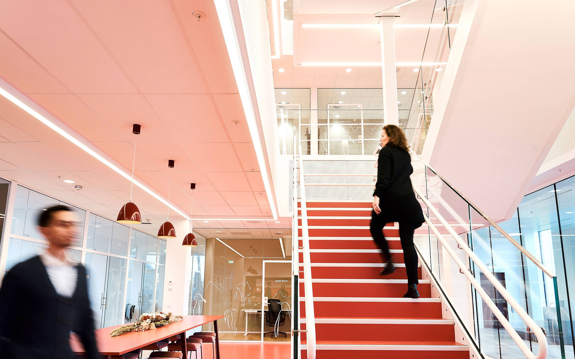 People walking in the stairs at Jotun's office in Sandefjord, Norway