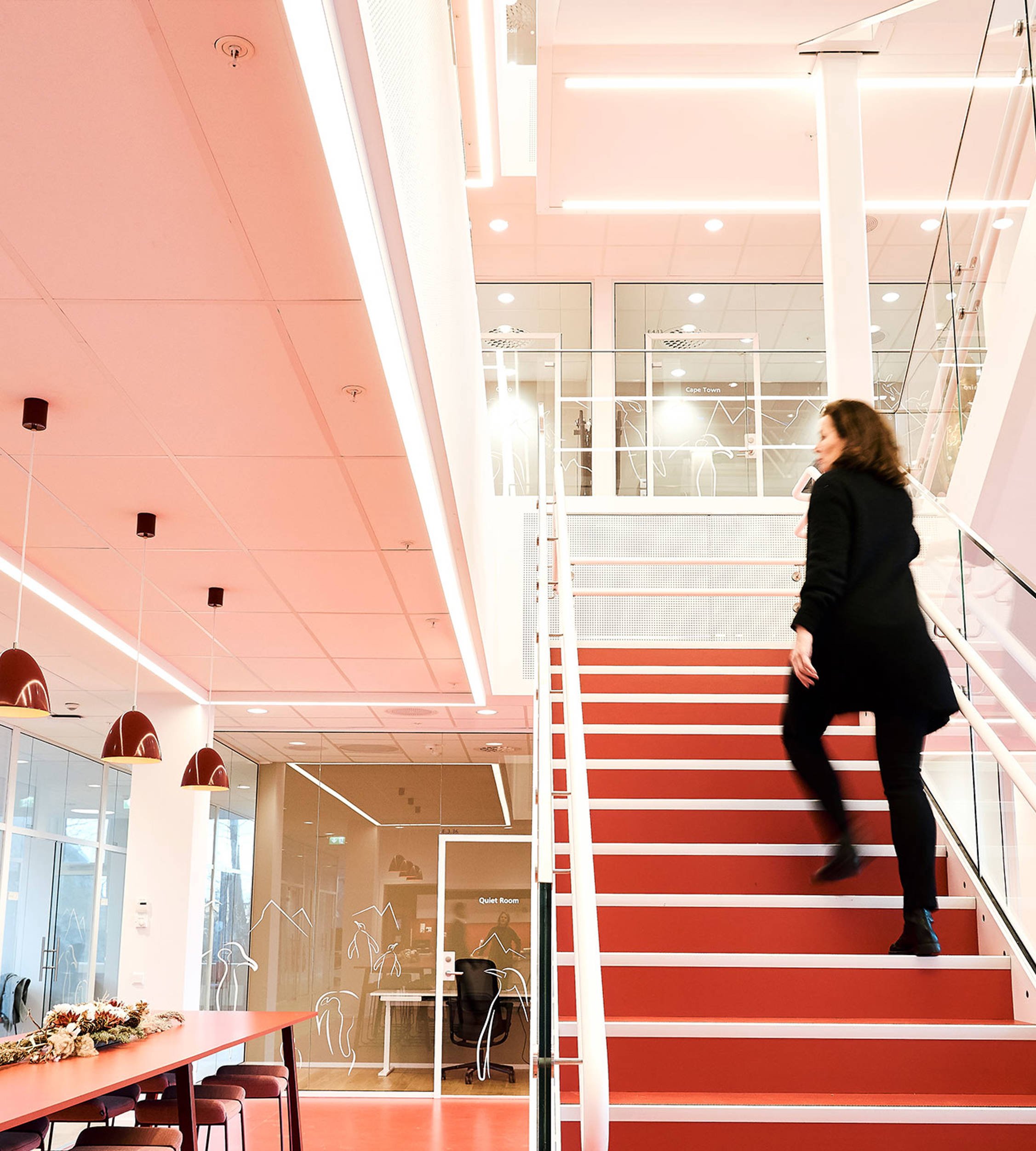 People walking in the stairs at Jotun's office in Sandefjord, Norway