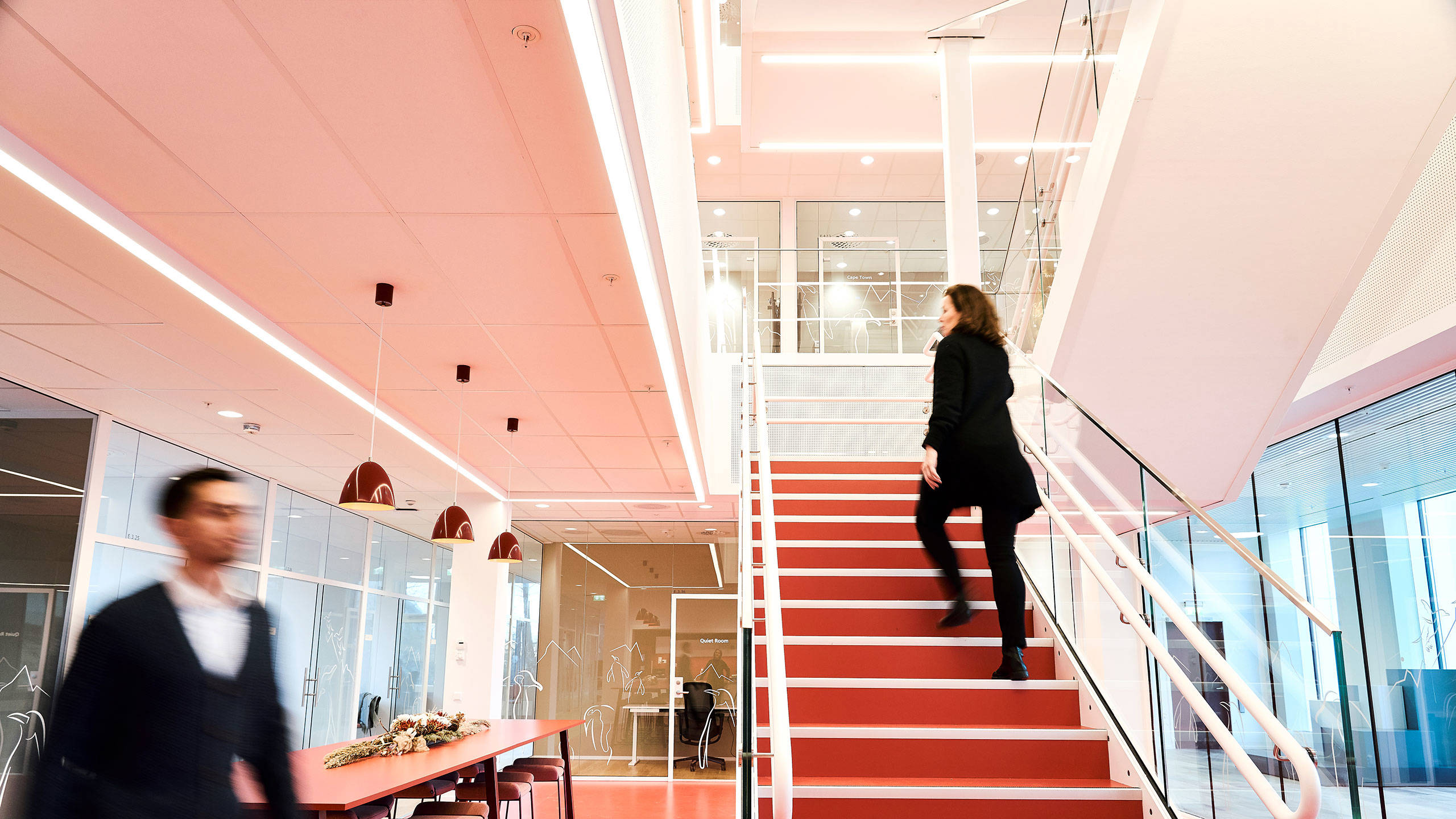 People walking in the stairs at Jotun's office in Sandefjord, Norway