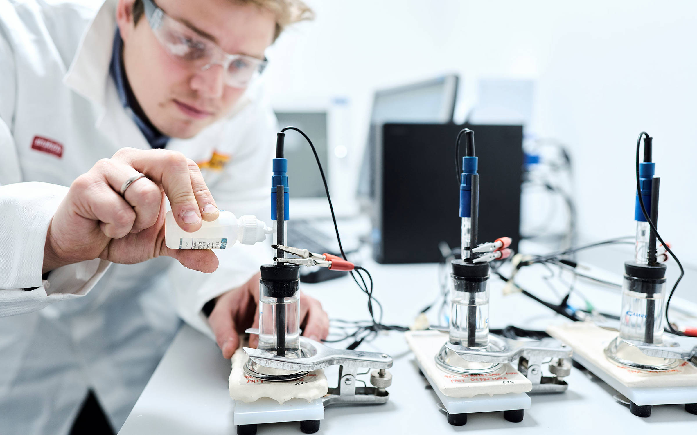 Scientist Andreas Løken at global paints and coatings company Jotun's main R&D Center in Sandefjord, Norway, performing electrochemical impedance spectroscopy (EIS) measurements in order to assess barrier properties of protective coatings. Photo: Jotun/Morten Rakke.