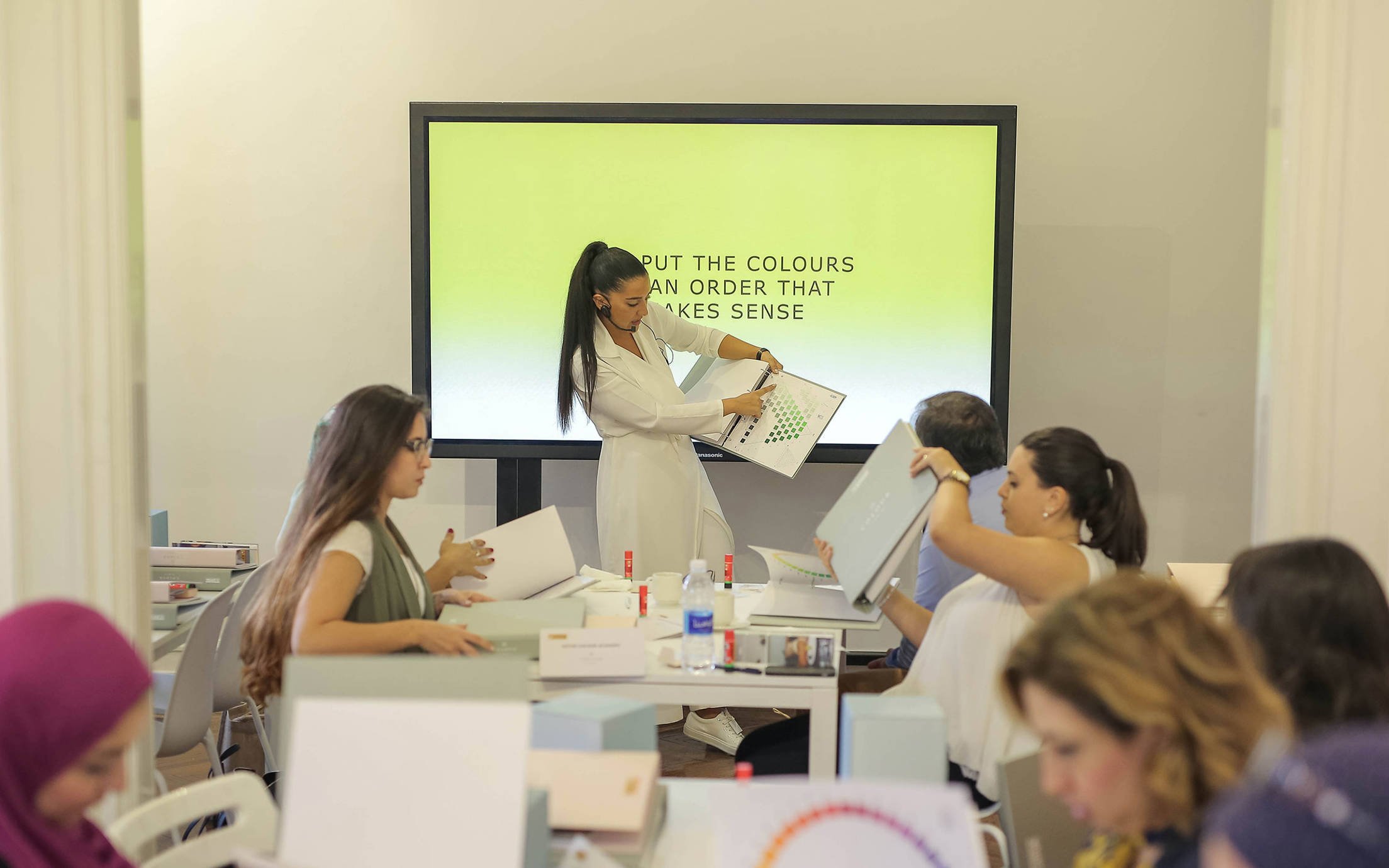 Regional Jotun Colour Marketing Manager Rana Khadra teaching a Jotun Colour academy class