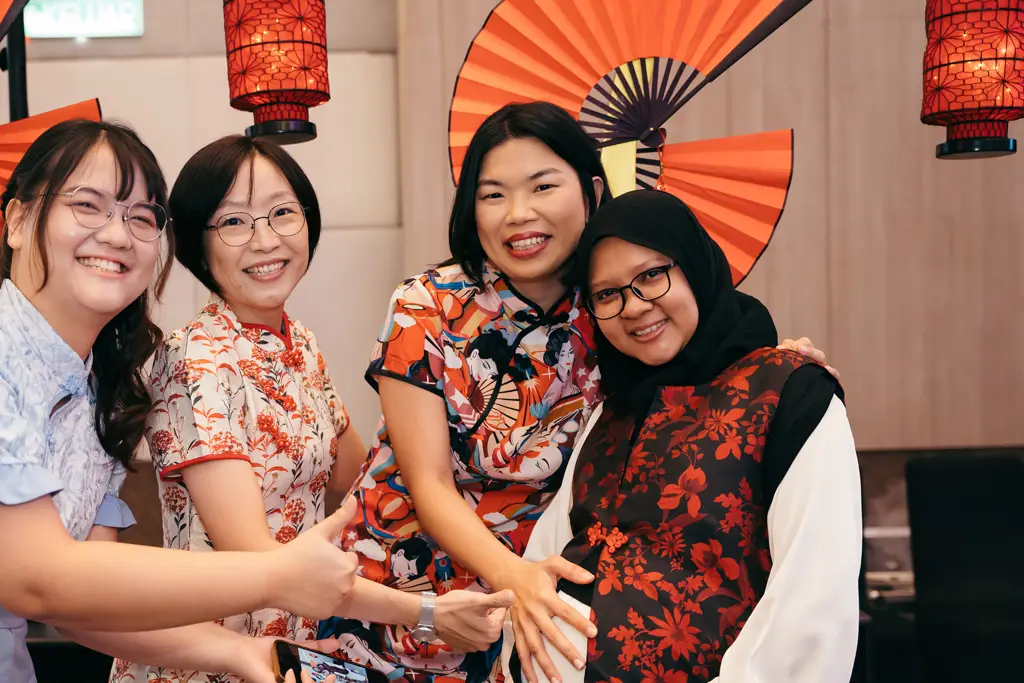 Four smiling women