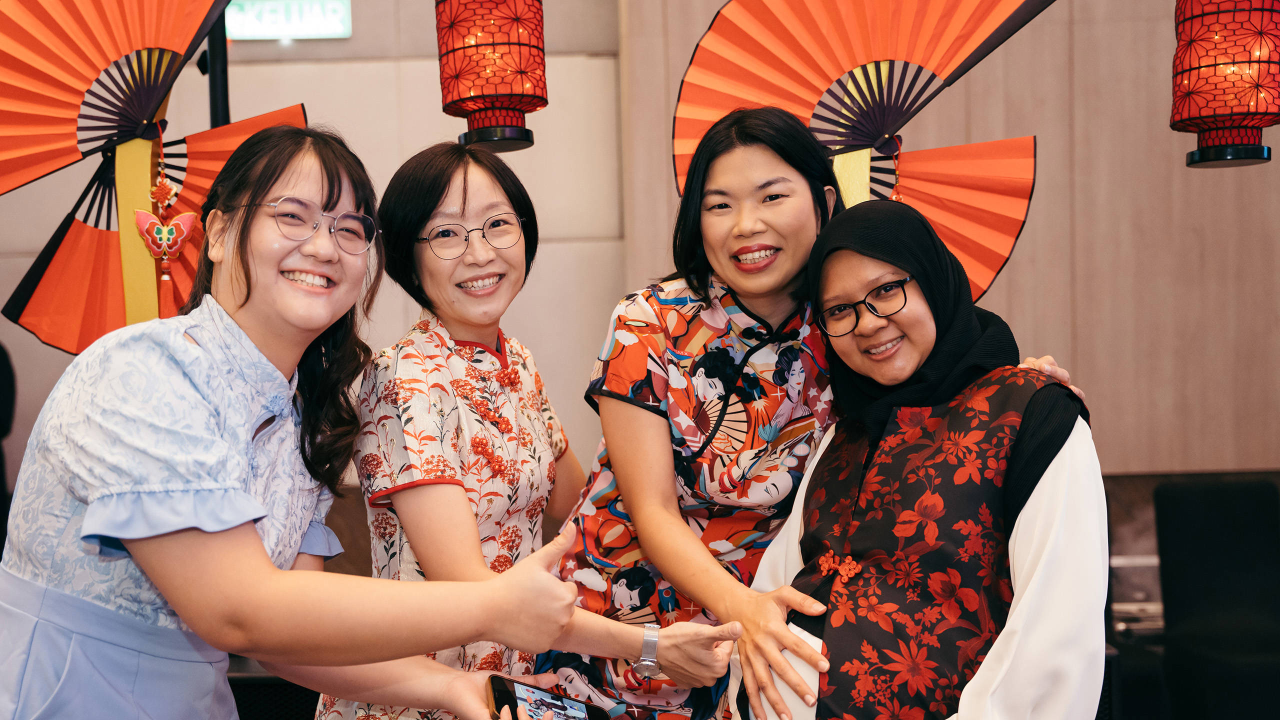 Four smiling women