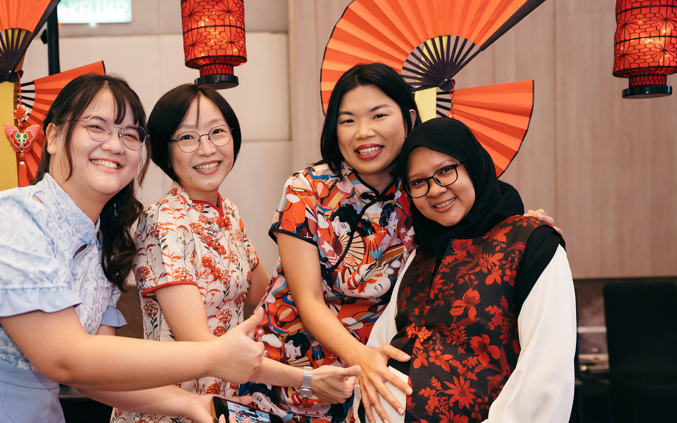 Four smiling women