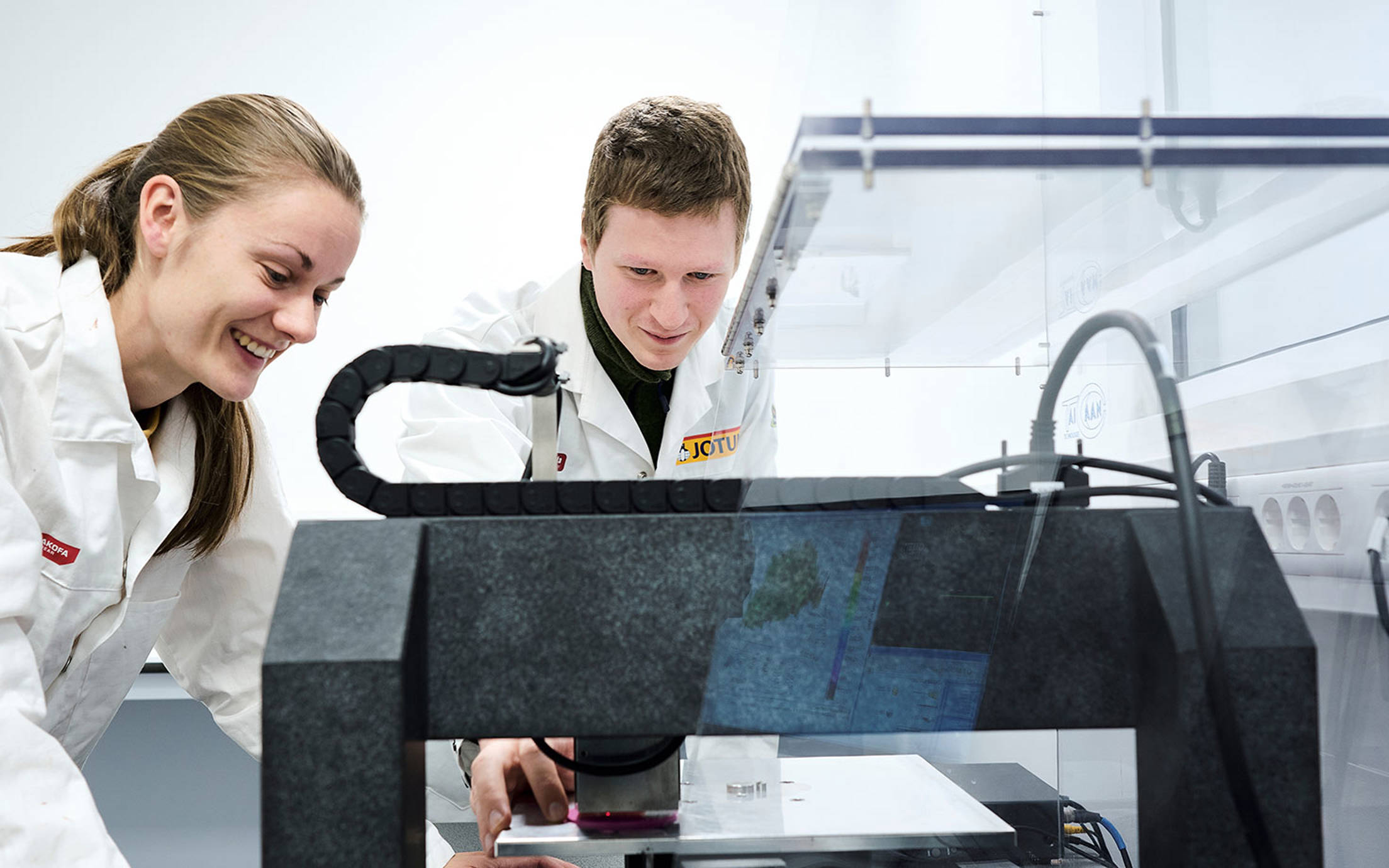 A female and a male scientist in the R&D centre in Norway