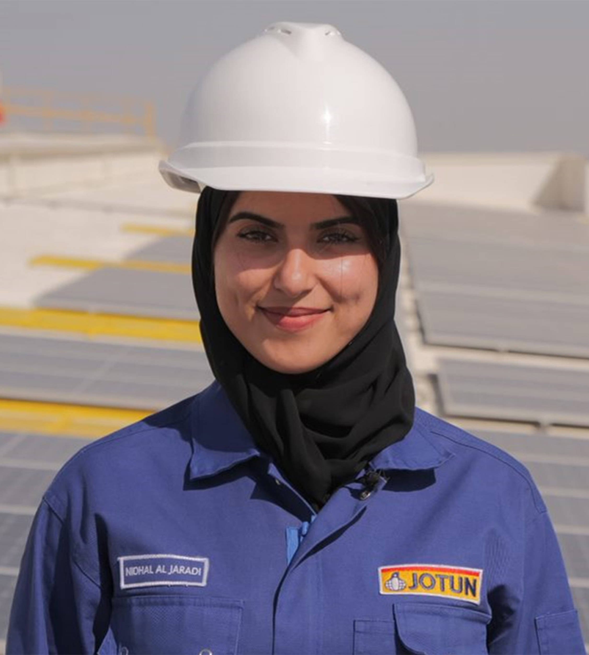 Woman on rooftop of the Jotun factory in Oman